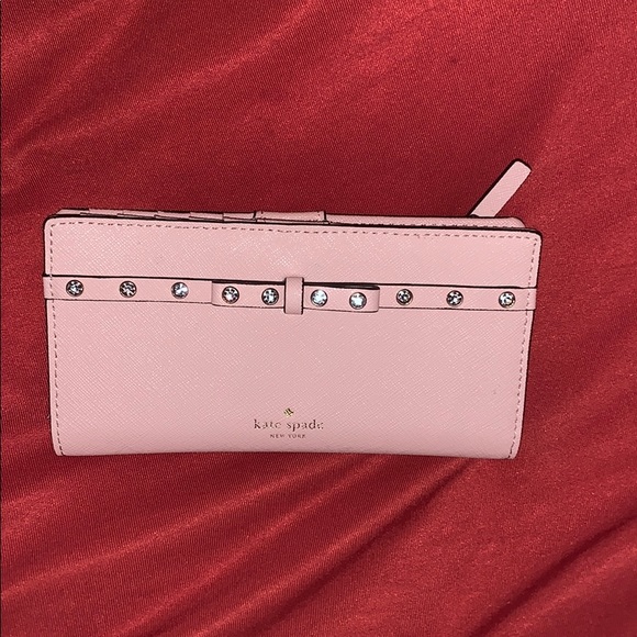 Pink Kate spade wallet with a bow - Picture 1 of 5